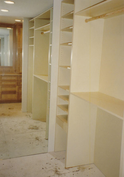 Closet with stylish cabinets by Maurer Construction