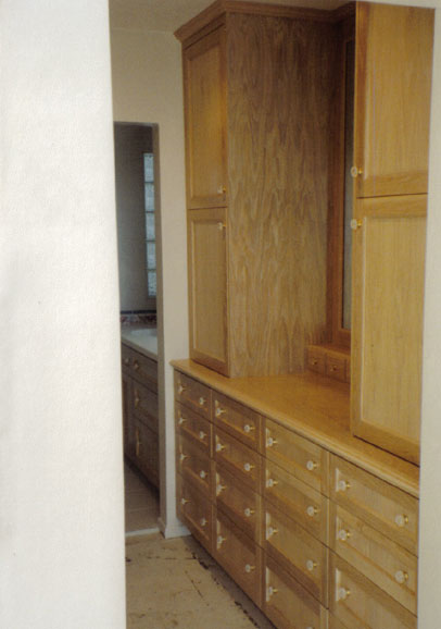 Contemporary closet with hanging space by Maurer Construction