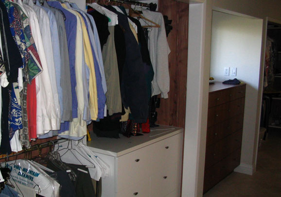 Custom closet with new lighting by Maurer Construction